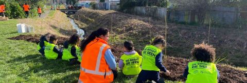 Everyone gets involved during winter planting of urban streams