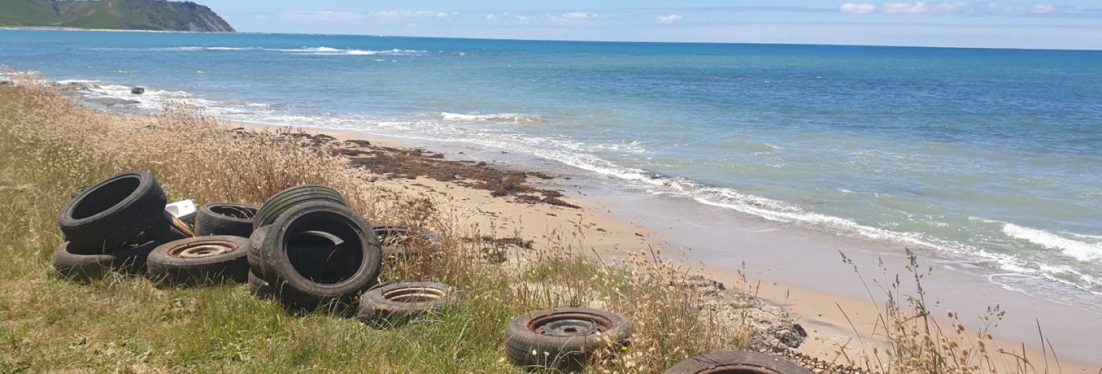 Tyres on the beach banner image